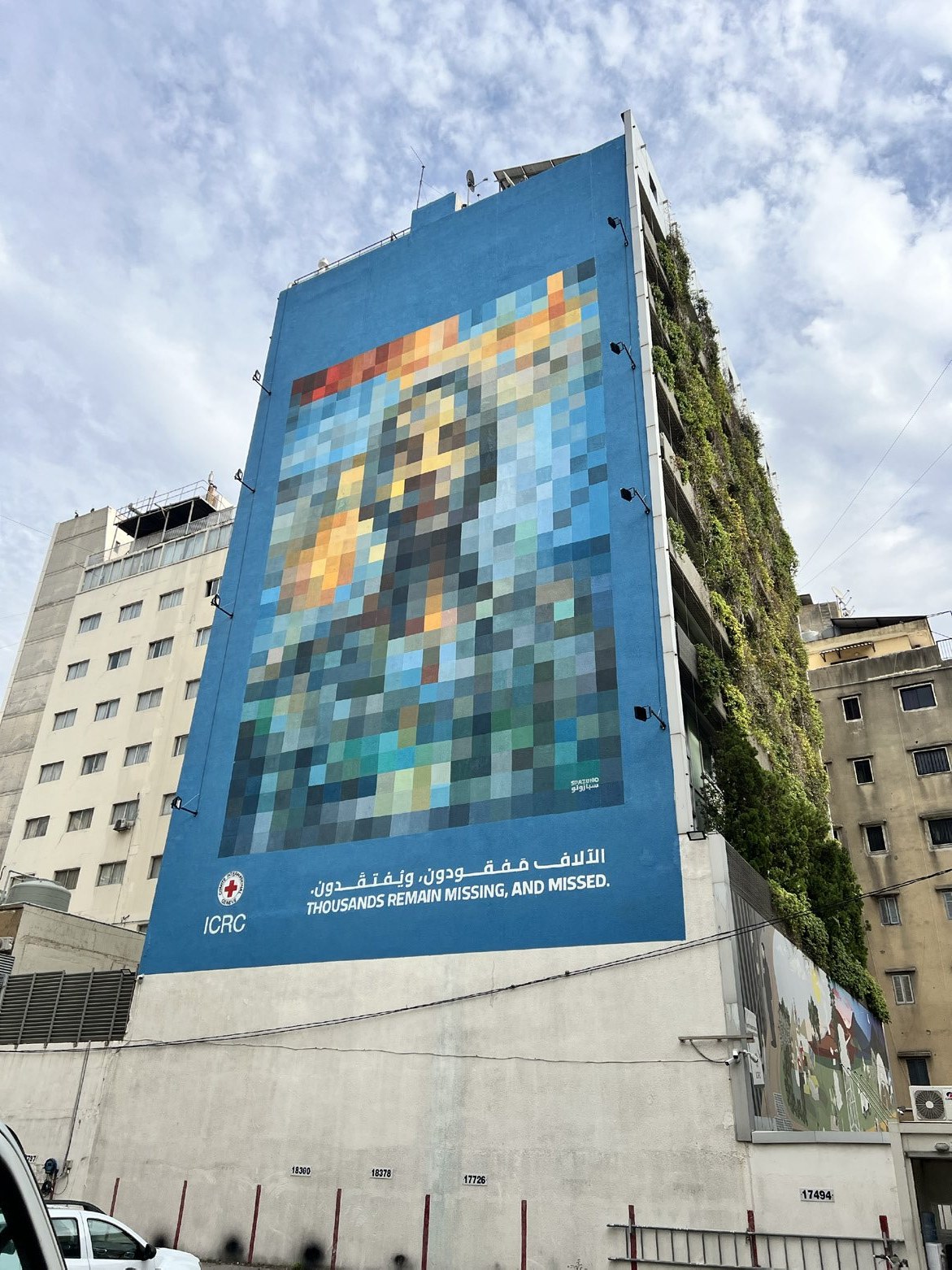 The full Thousands remain missing, and missed mural, from the rooftop to the base of the facade, Hamra, Beirut, 2025.